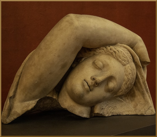 Statue of a woman sleepng